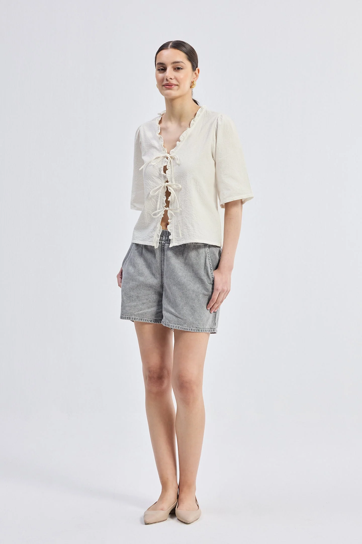 Relaxed Fit Top With Ruffles and Front-Ties in Cream